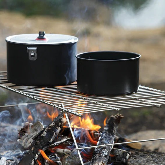 Coghlan's Camp Grill with pots
