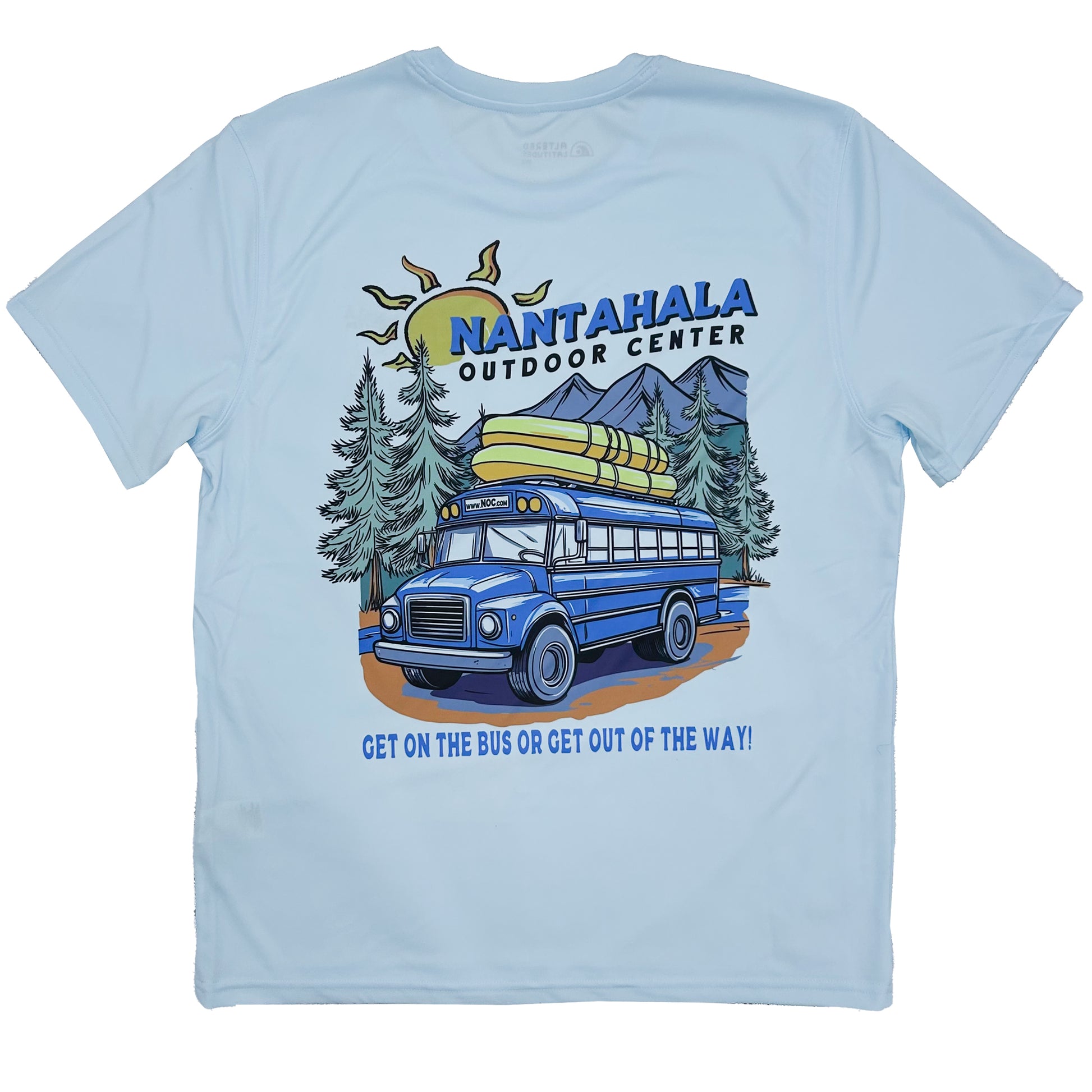 A light blue short-sleeve t-shirt with a colorful graphic on the front featuring a blue bus, yellow sleeping bags, pine trees, mountains, and the text 'NANTAHALA OUTDOOR CENTER' and 'GET ON THE BUS OR GET OUT OF THE WAY!'.